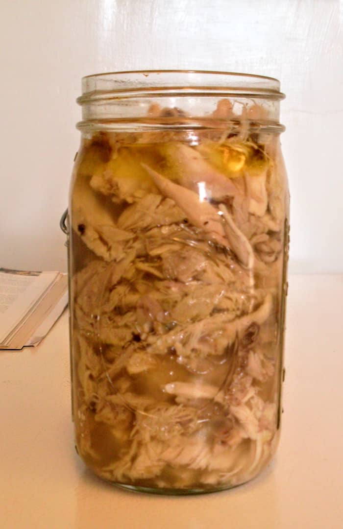 This is what a full jar of chicken will look like. The measurement at the top is called the required headspace, and allows the product to expand during boiling.