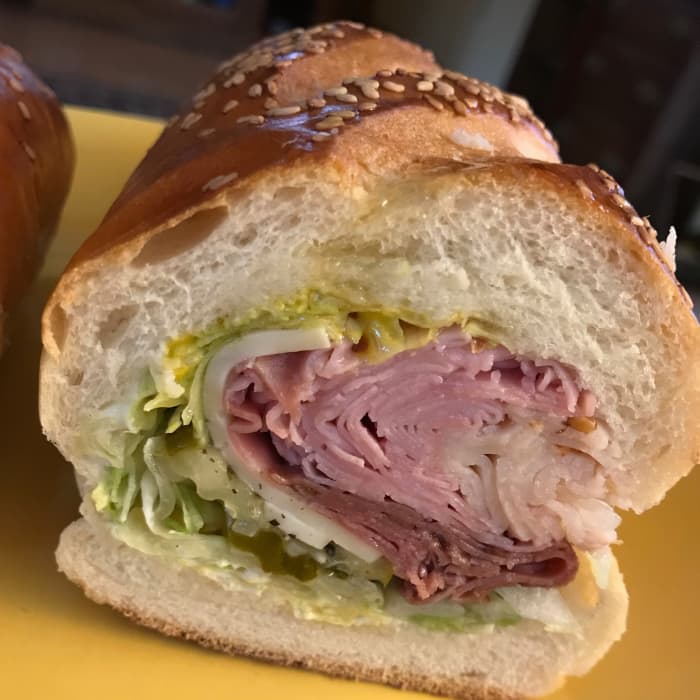 If you don't have time to cook, pick up a tray of ready-made sandwiches. They are already cut into small sections.
