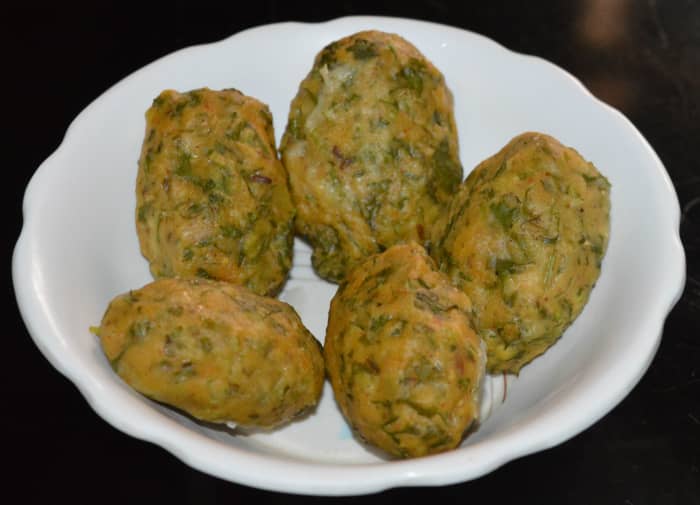 Serve kothimbir vadi hot with tomato sauce or any other chutney. Alternatively, you can shallow-fry the chopped balls in oil, adding mustard, curry leaves, and asafoetida powder seasoning. Both varieties taste yummy.