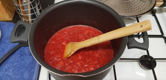 The strawberries and raspberries broke down to my preference just after the sugar had dissolved before being brought to a rolling boil.