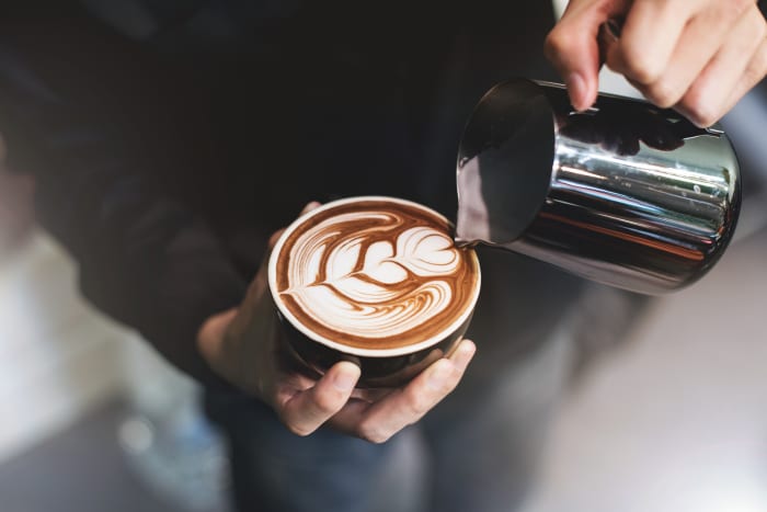 These days, many baristas adorn the foam atop cappuccinos and lattes with designs known as "latte art."
