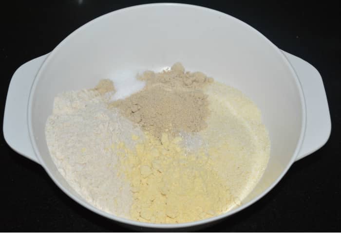 Step one: In a large mixing bowl, add all the ingredients listed under "for the batter," except lemon juice and baking soda.