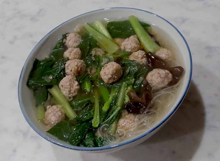 Dongcai pork balls with mung bean thread noodles in clear soup