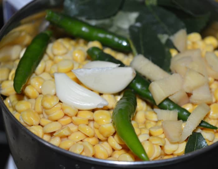 Step one: Add soaked and drained chickpeas into a blender while keeping aside 2 tablespoons of them for later use.