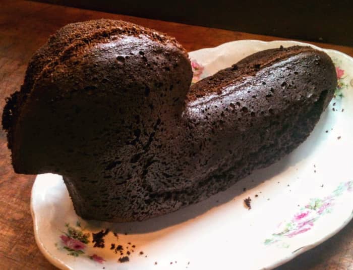 Cracks or imperfections on the surface of the cake may develop from a too-hot baking temperature. These can be covered by frosting, but it does mean the cake will be fragile.