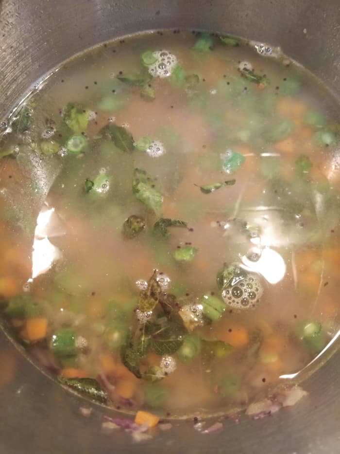 Add 1 cup of water. (Adjust water according to the type of rava you are using. I used a fine variety rava called Bombay rava. The ratio used here is 1:2; i.e., for 1 cup of rava I used 2 cups of water). Add salt.
