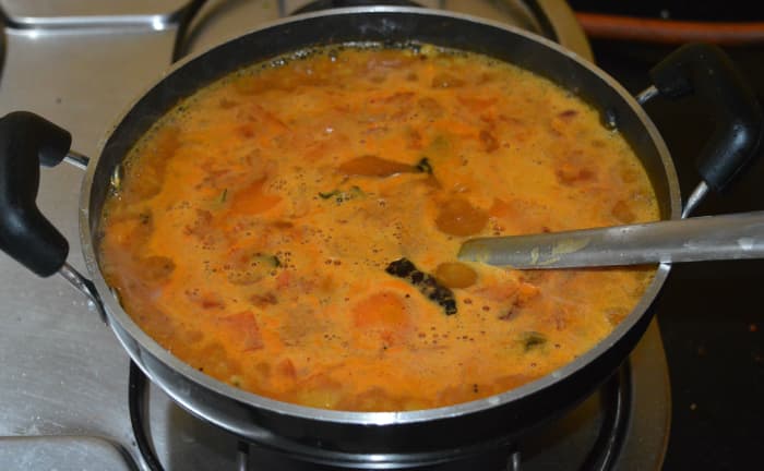 Mix it well. Let the mixture boil for 4 minutes. Add chopped coriander leaves. Stir the mixture once. Turn off heat.