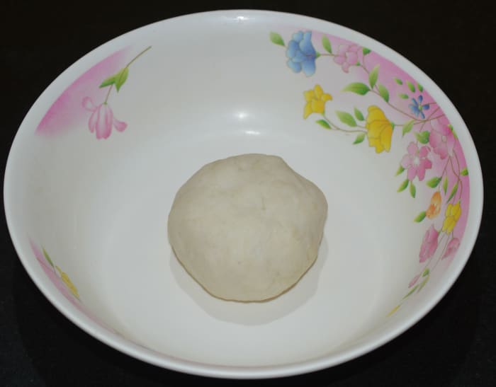 Step three: Prepare a dough with all-purpose flour, salt, and a little oil as per instructions for making the tortillas. Rest the dough, covered, for 10 minutes.