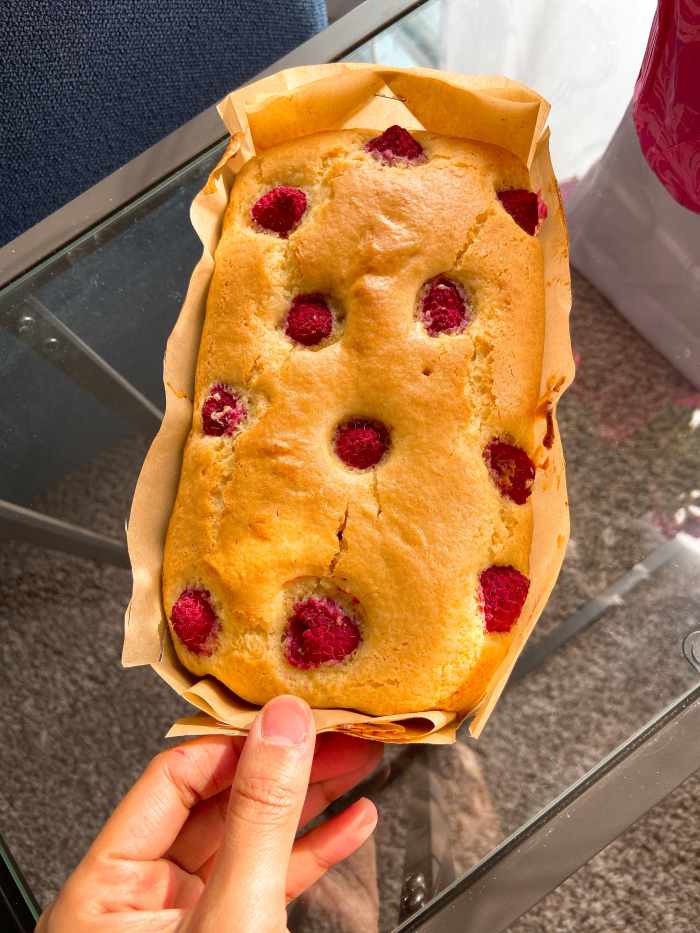Fresh baked lemon bread with raspberry filling. Let it cool before putting the glaze on top.