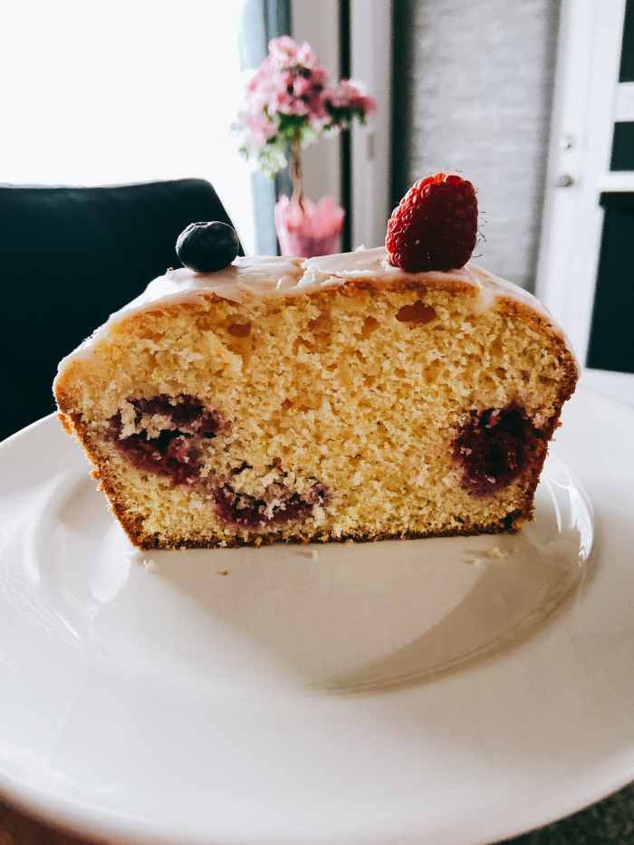 Yummy slice of lemon raspberry bread with lemon glaze.