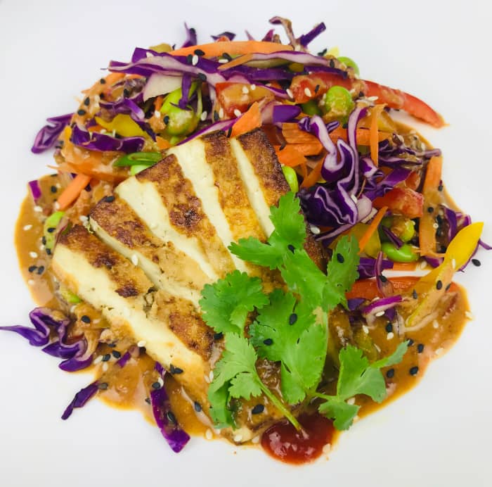 Combine all salad ingredients together. Then place a scoop of quinoa on your plate and cover with salad. Top with dressing, sesame seeds, and other optional ingredients such as bean sprouts or cilantro.