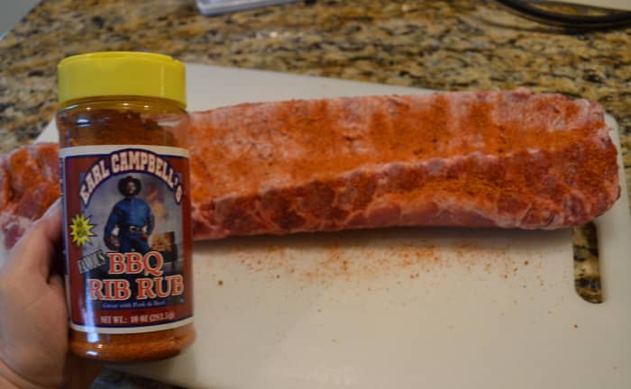 Generously sprinkle ribs with your favorite rib rub and gently rub or press into the meat. We love Earl Campbell's Famous BBQ Rib Rub.
