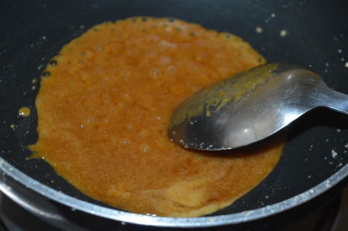 Cook it over low heat while stirring continuously until it liquefies. Increase the heat a little bit and allow it to boil for 2-3 minutes.