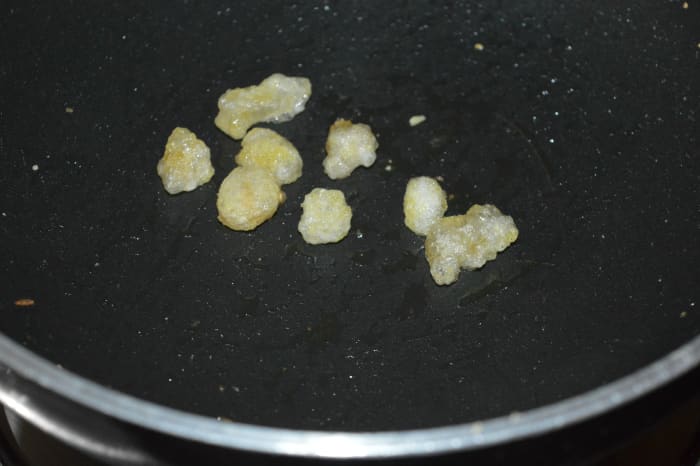 In the same pan, saute the edible gum until they become big. Transfer it to a plate and allow it to cool. Afterward, powder it.