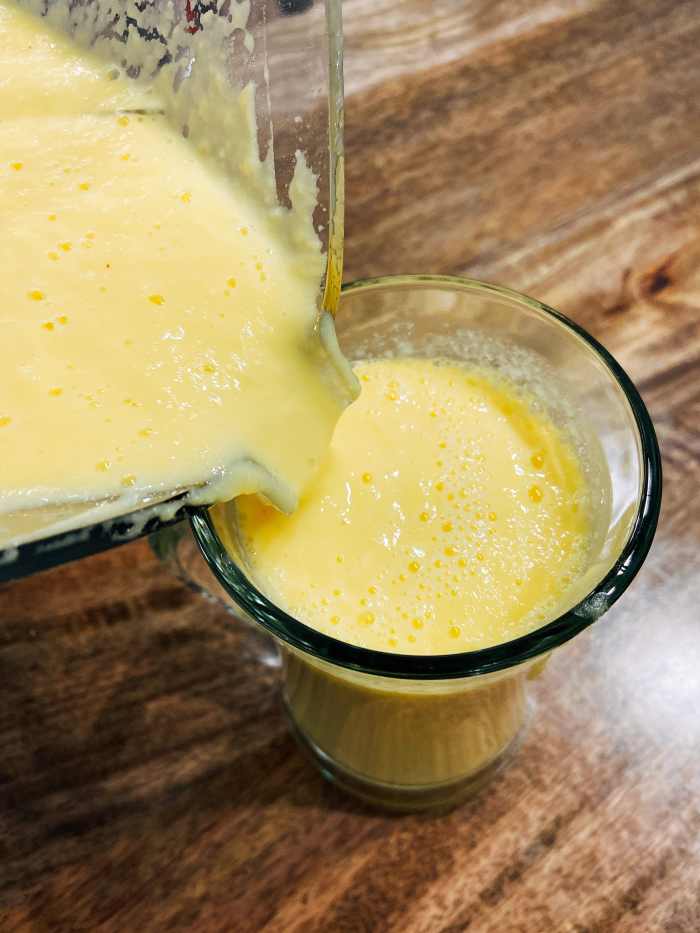 Pour the smoothie into a tall glass. 