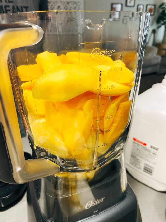 Combine the pineapple and mangoes. 