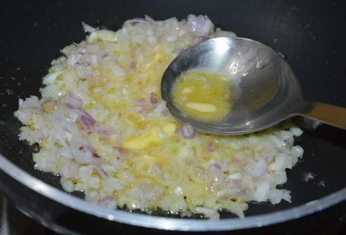 Step three: Add butter to a deep-bottomed pan. Saute chopped onions for 1 minute.