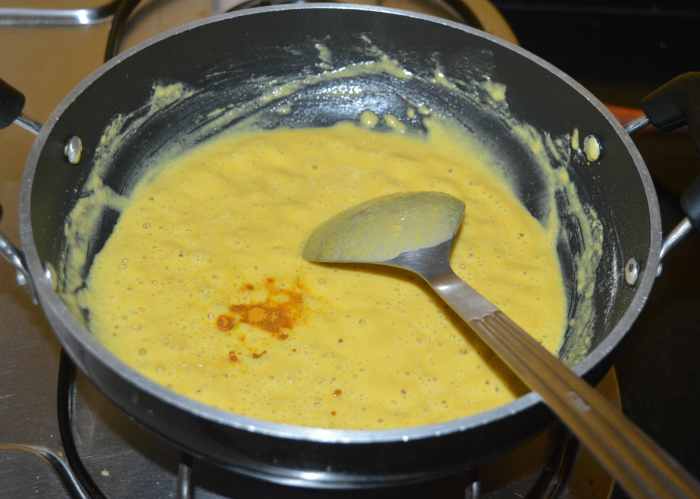 Add turmeric powder or yellow food coloring.