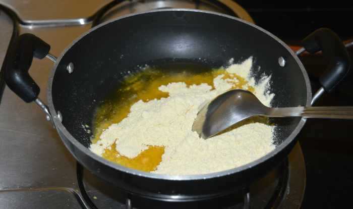 Step one: Saute the besan powder in ghee until it becomes slightly golden brown.
