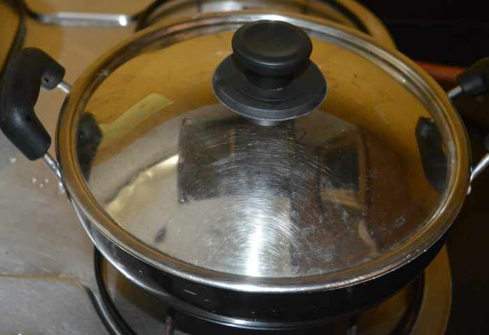 Cover the pan and decrease the heat. Cook for 6-8 minutes while turning the okra occasionally. Sprinkle a few drops of water if you feel the okra is too dry. Turn off heat.