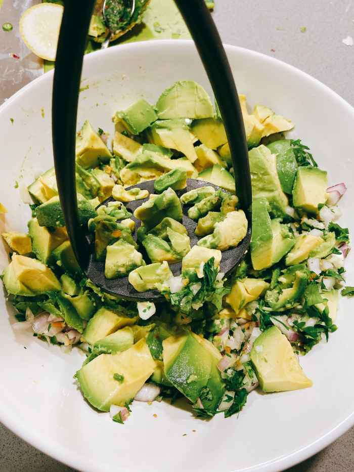 Mash the avocado with a potato masher or fork.