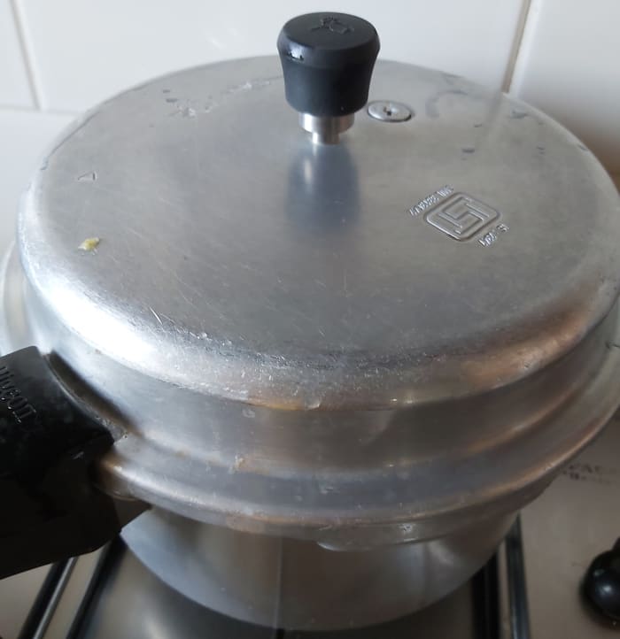 Close the lid and take 3 whistles (depends on the variety of rice you are using). Switch off the flame and let the pressure release by itself.