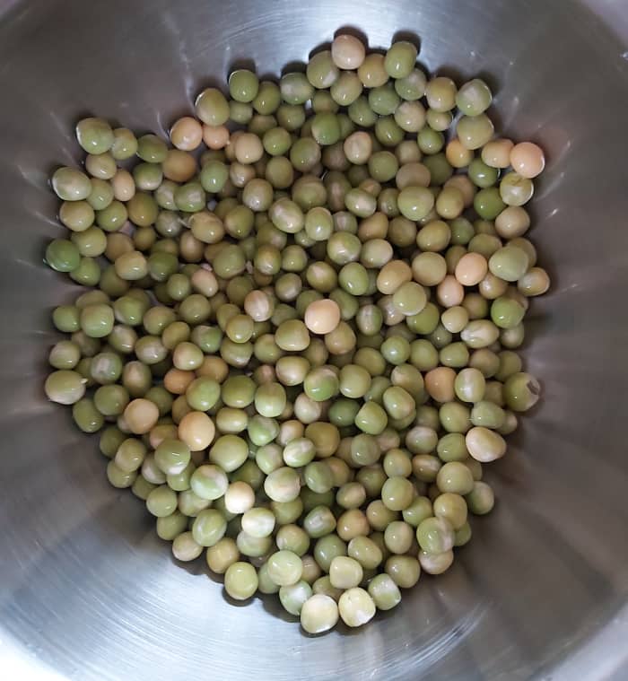 Soak the dry peas overnight, drain, and set aside. (Skip this step if you are using fresh or frozen peas.)