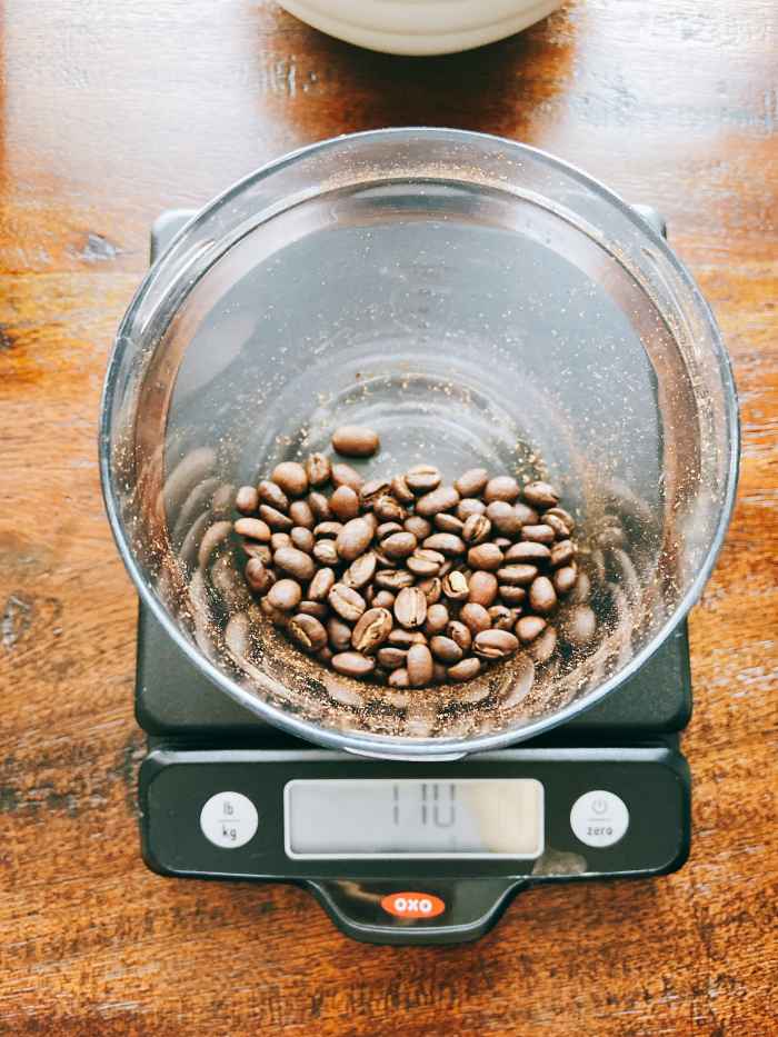 Weigh 110 grams of freshly roasted coffee beans.