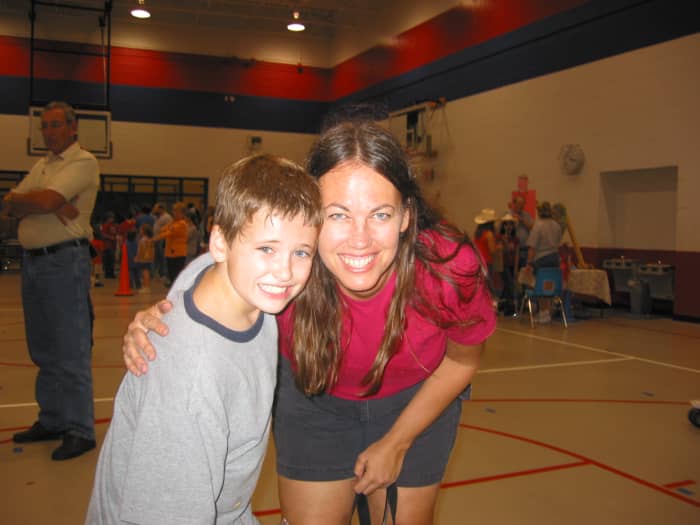 My son and I, waiting in a long line to register for kindergarten. At least we did get someone in line to take this nice shot of us!