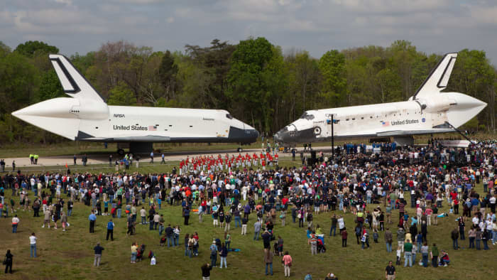 Enterprise (L) and Discovery (R) changing places at the Smithsonian's Udvar-Hazy Center.