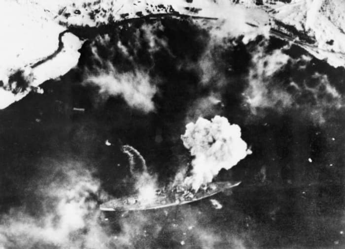 WWII: Fleet Air Arm attack the German battleship Tirpitz with heavy and medium sized bombs as she was about to move off from her anchorage at Alten Fjord, Norway, on the morning of 3 April 1944.