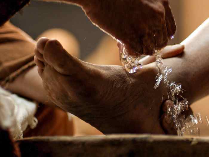 Foot washing was a common custom when guests visited. It was done by lowly servants. Here Jesus washes the disciples' feet.