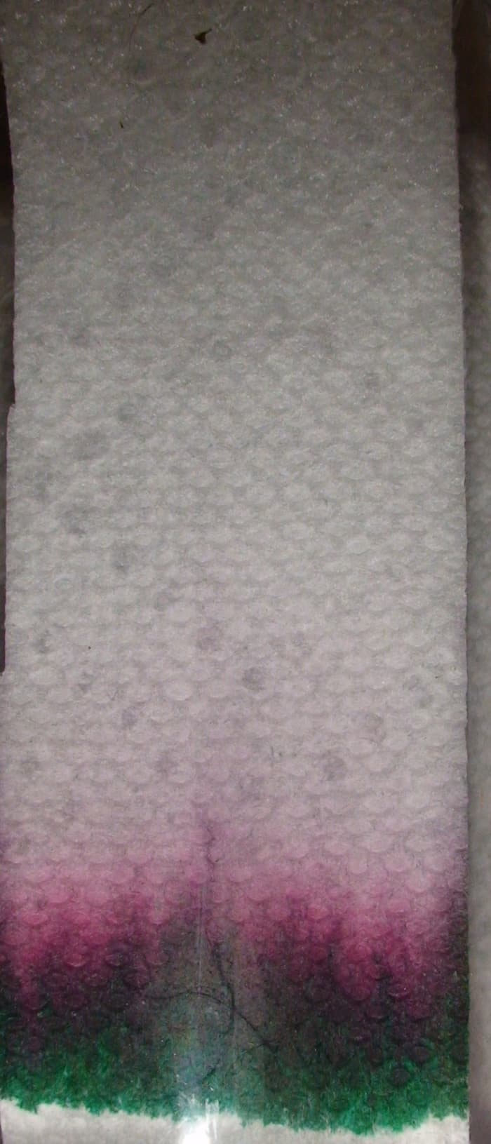 This chromagraph of black ink used rubbing alcohol as a solvent. Comparing a chromatogram made with the same solid medium and solvent, a comparison can be made to determine the type and brand of ink used at a crime scene.