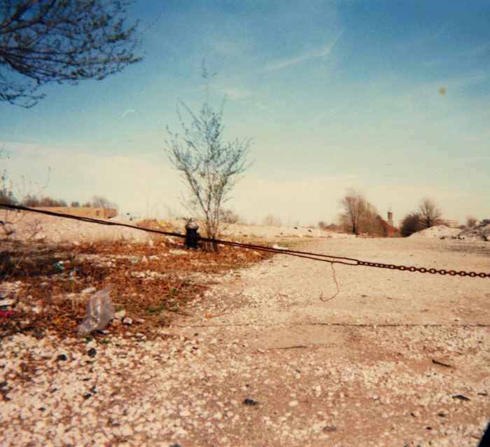 Looking east from 1301 N. Jefferson Avenue, April , 1996. A fire hydrant still stands next to the rubble of what used to be the major street headed into the project.