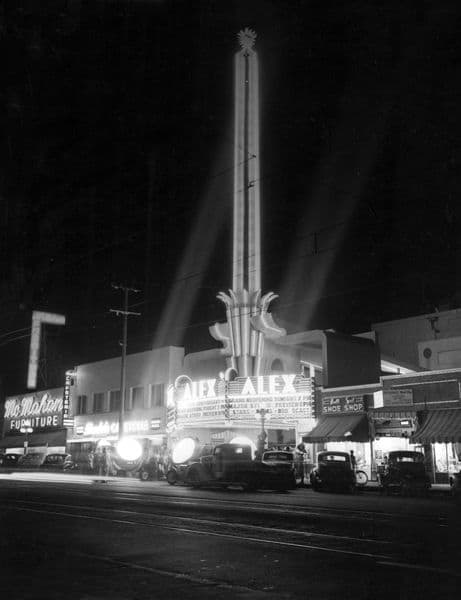 Alex Theatre in Glendale. The front is the art deco ticket booth. Then the guests enter an open to the sky anteroom then enter the decorative doors to the deco opulence in the main theater lobby. Finally, go to your seats and watch the curtains part.