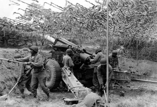 155mm battery, Normandy 1944. One of the most subtle but important changes between the wars was the use of pneumatic tires.