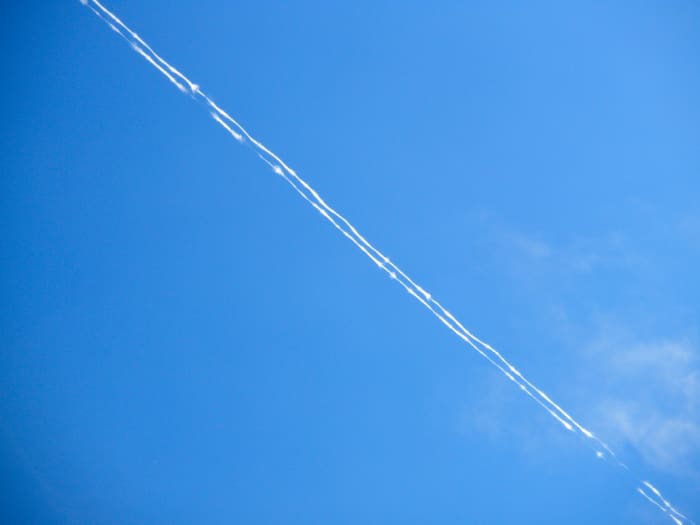 When temperatures are very cold but the air is dry, contrails will persist longer without spreading.