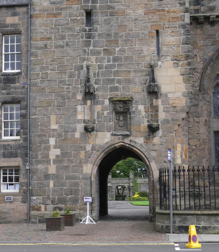 It is said that you can see Patrick Hamilton's face in the stonework. Zoom in to the brickwork and you might see where!