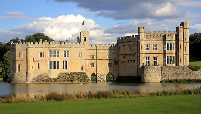 Leeds Castle photographed from the western side of the surrounding lake. On the left is the 13th century 'Gloriette'. On the right is the more recent 'New Castle'