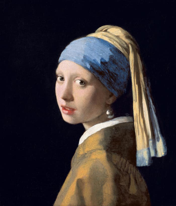 17th century Dutch painter Johannes Vermeer painted her daughter Maria wearing blue headscarf and pearl earrings, using oil and canvas.