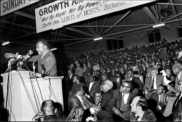 Martin Luther King Jr. spoke to more than 10,000 people at Mason Temple in Memphis, Tennessee in support of striking sanitation workers on March 18. He pledged to return to Memphis on March 22 to lead a march.