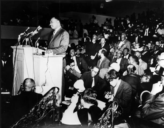 Dr. Martin Luther King, Jr. speaks to a crowd in Memphis during the AFSCME Local 1733 sanitation workers' strike.