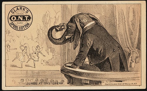 Jumbo at the opera complete with tailcoat and opera glasses in his trunk. This time he's peddling cotton.