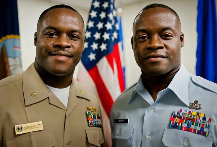 Identical twins in the U.S. military, but look closely and you'll see subtle differences.