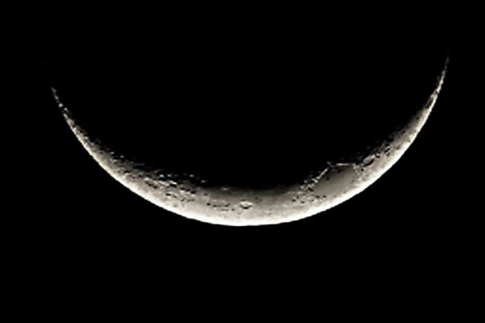 The smile of the Moon - the crescent Moon as seen at or near the equator, is orientated differently to the way we would see it at more northern or southern latitudes
