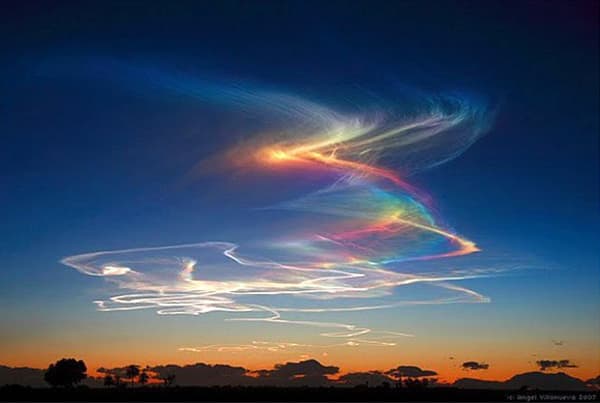 Fire rainbows or the circumhorizontal arc is an optical phenomenon which is formed in the cirrus or cirrustratus clouds. It is an ice halo formed by the refraction of sunlight and moonlight in plate-shaped ice crystals suspended in the atmosphere.