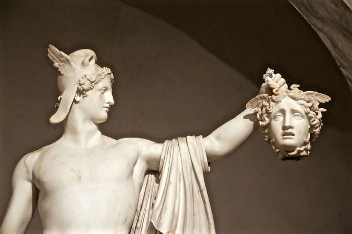 Perseus and Medusa immortalized in marble by Italian sculptor Antonio Canova. The story is one of the most famous Greek myths and a must-know for any Greek vacation.