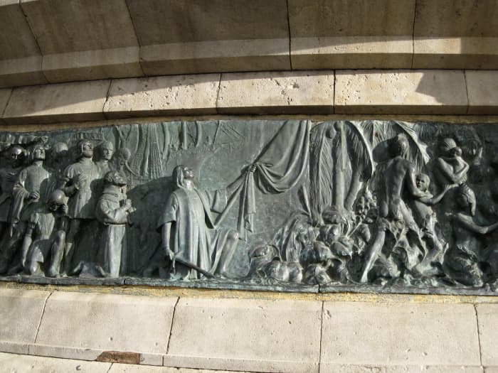 Bronze Sculpture of Columbus landing in the New World. Sculpture at base of Columbus Monument in Barcelona, Spain.