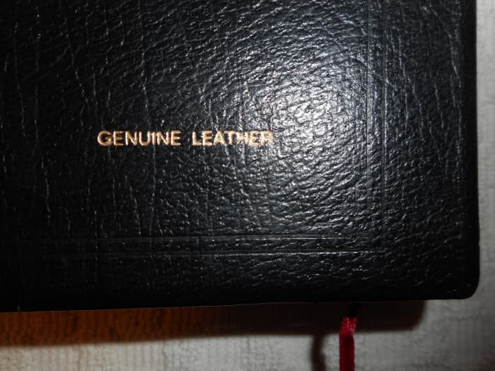 The more modern leather Bibles will have the type of leather named on the back cover in the lower right hand corner.