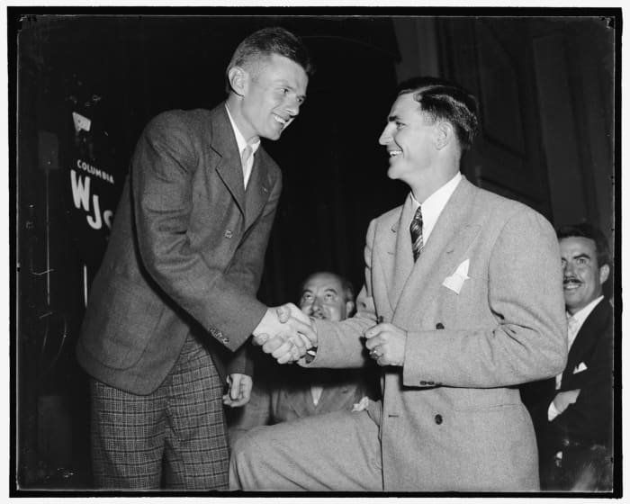 Corrigan meets NFL quarterback Sammy Baugh